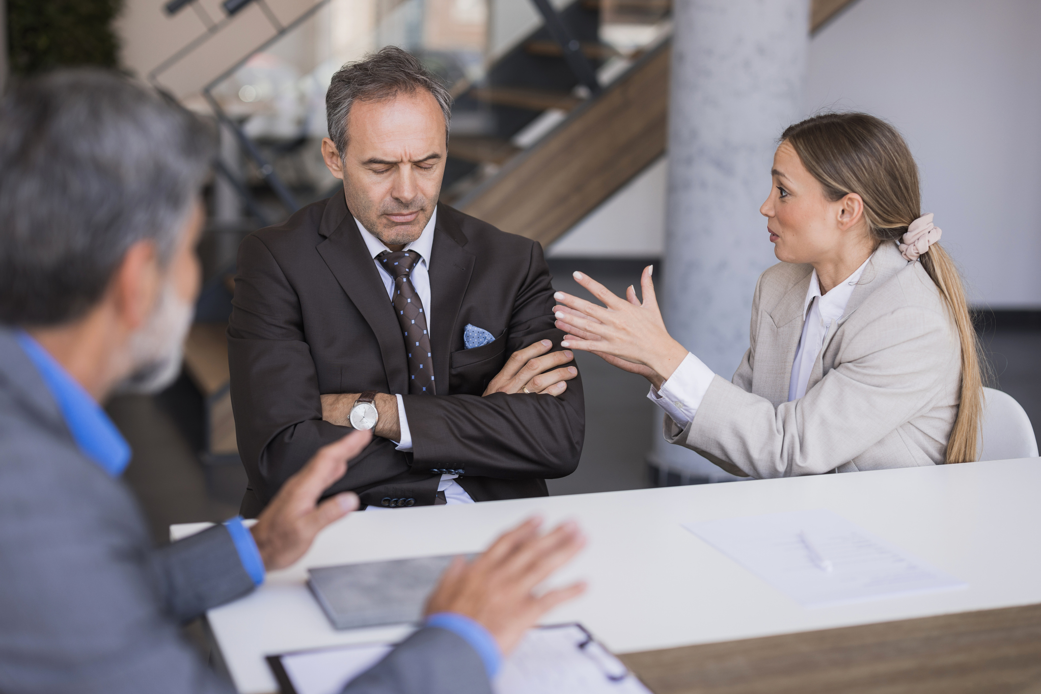 Business colleagues arguing during a difficult office meeting