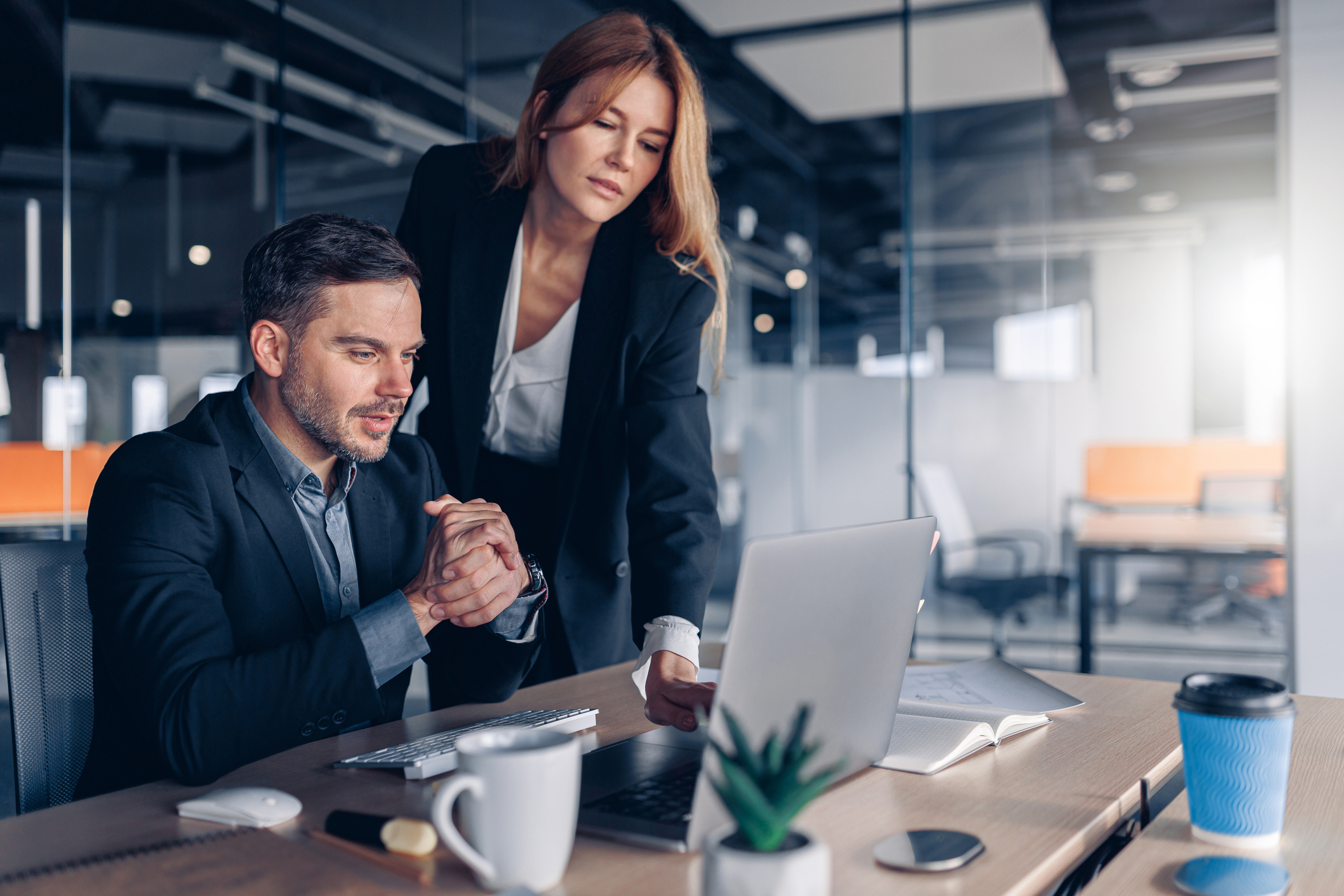 Busy coworkers cooperating and working together at office meeting, teamwork concept