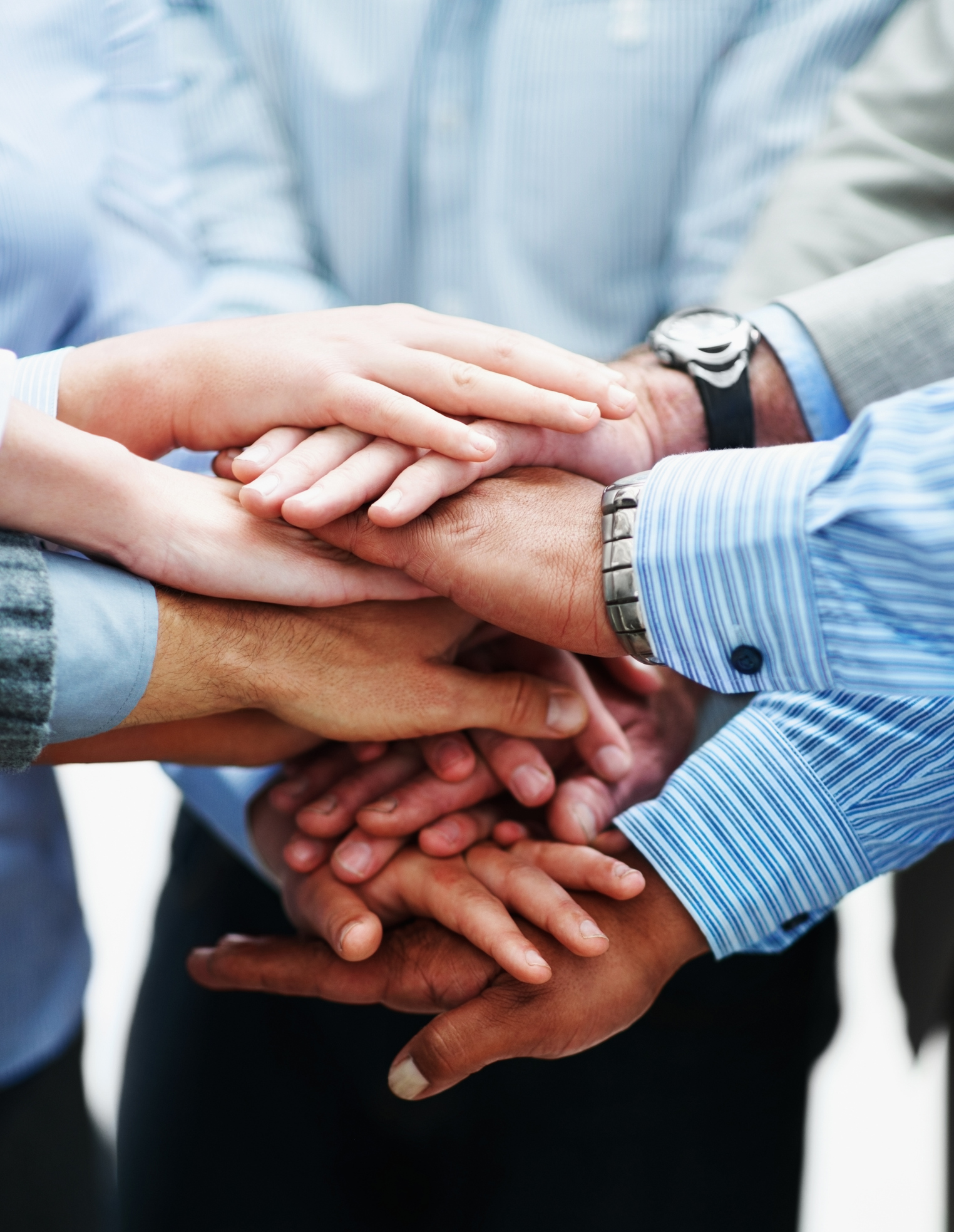 Closeup of a business people with hands together