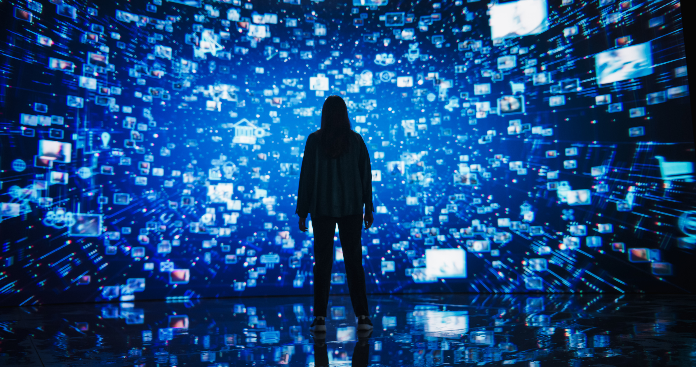 Young Woman Standing Before a Dynamic Digital Screen, Immersed in Internet Visualization. Internet Cyberspace with Web Content, Icons, Animated Stream of Online Applications and Entertainment
