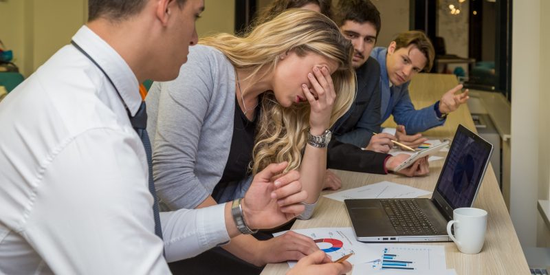 Unhappy businesswoman on a corporate meeting