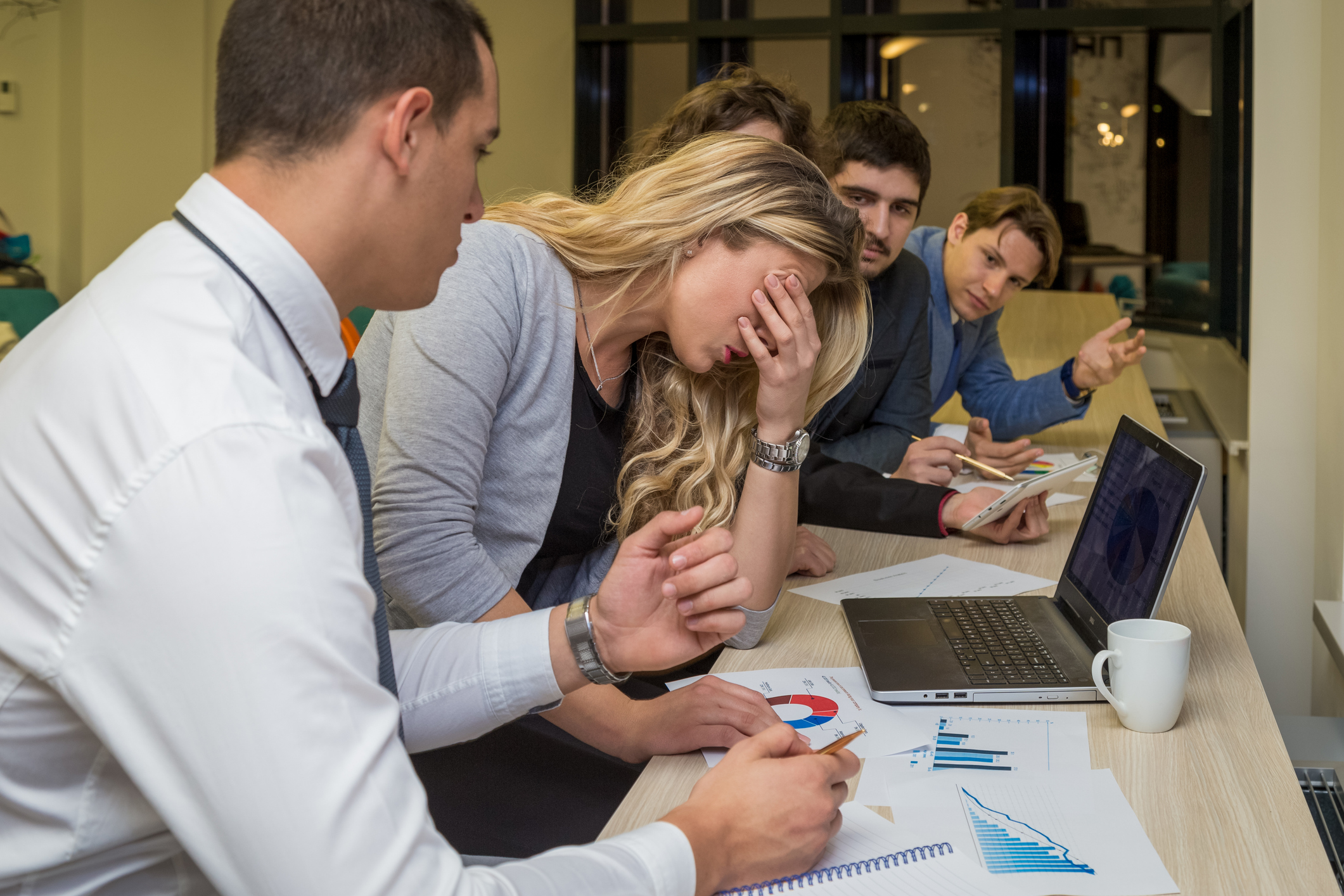 Unhappy businesswoman on a corporate meeting